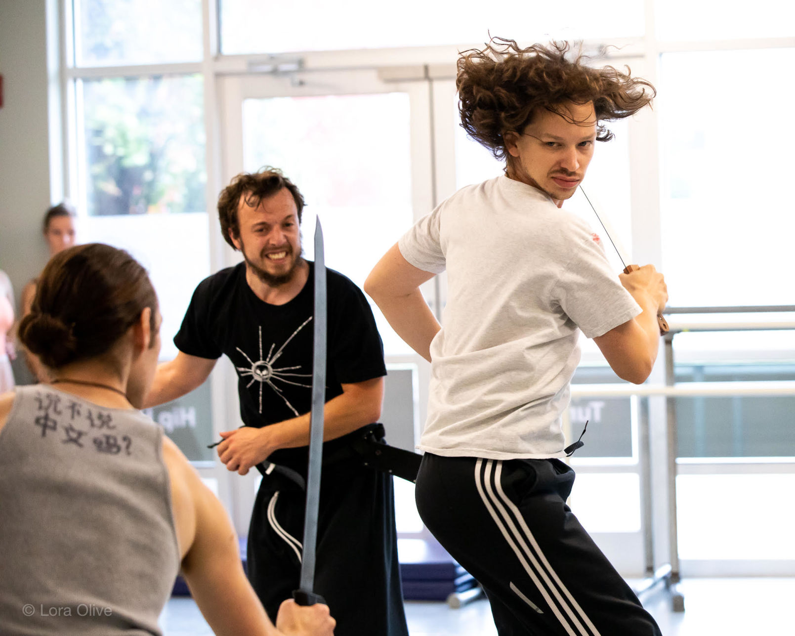 Artistic Director Stirling Matheson (right) shows them how it's done